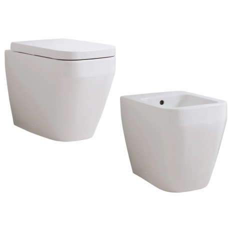 Sanitari Filo Muro Vaso con Coprivaso a chiusura rallentata + Bidet modello sott'acqua marca Isvea Bianchi lucidi