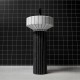 Lavabo a Terra Freestanding 024 di antoniolupi in pietra naturale bianco carrara/nero marquinia